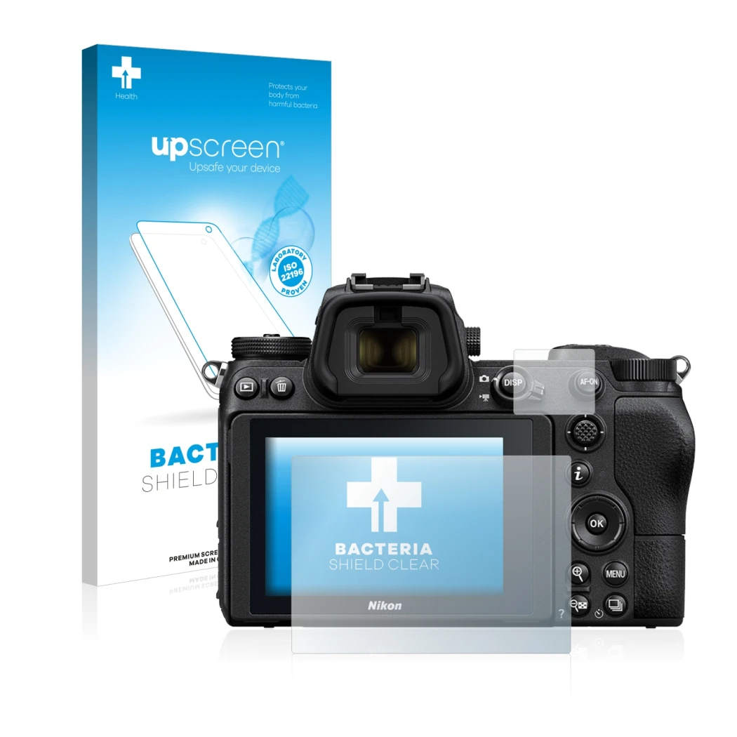 Parte frontal de un envase de producto con el logotipo de la marca upscreen. Al lado se muestra el dispositivo Nikon Z 6 con s
