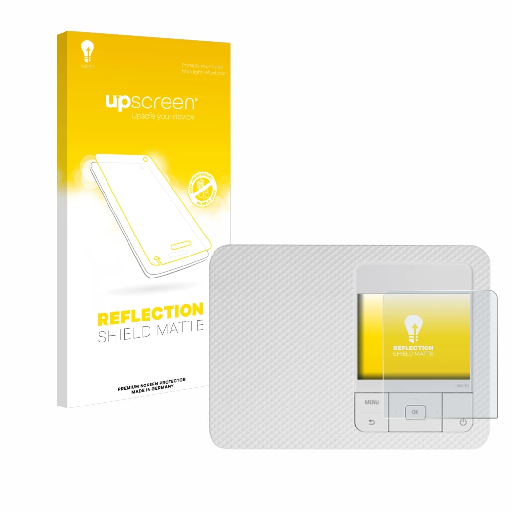 Parte frontal de un envase de producto con el logotipo de la marca upscreen. Al lado se muestra el dispositivo Canon Selphy CP