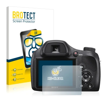 Parte frontal de un envase de producto con el logotipo de la marca BROTECT. Al lado se muestra el dispositivo Sony Cyber-Shot 