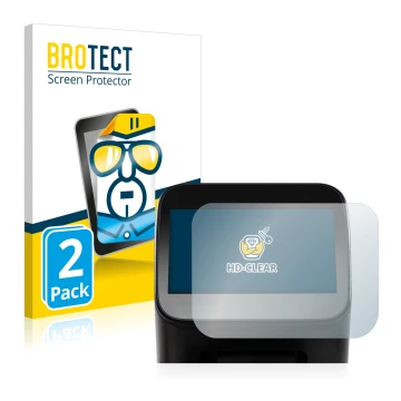 Parte frontal de un envase de producto con el logotipo de la marca BROTECT. Al lado se muestra el dispositivo Shaper Origin Ge