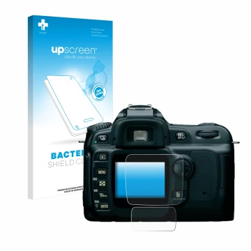 Parte frontal de un envase de producto con el logotipo de la marca upscreen. Al lado se muestra el dispositivo Nikon D50 con s