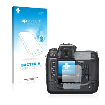 Parte frontal de un envase de producto con el logotipo de la marca upscreen. Al lado se muestra el dispositivo Nikon D2X con s