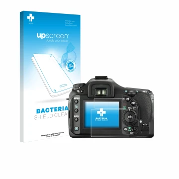 Parte frontal de un envase de producto con el logotipo de la marca upscreen. Al lado se muestra el dispositivo Pentax K20D con