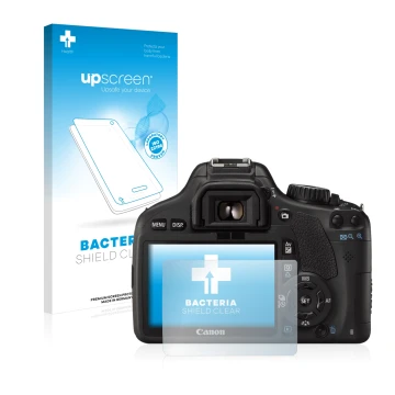 Parte frontal de un envase de producto con el logotipo de la marca upscreen. Al lado se muestra el dispositivo Canon EOS 550D 