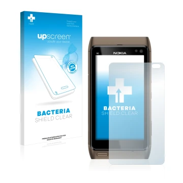 Parte frontal de un envase de producto con el logotipo de la marca upscreen. Al lado se muestra el dispositivo Nokia n8 con su