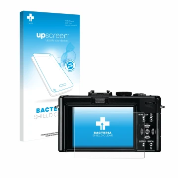 Parte frontal de un envase de producto con el logotipo de la marca upscreen. Al lado se muestra el dispositivo Leica D-Lux 5 c