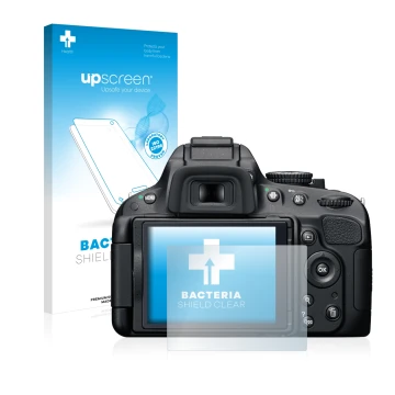 Parte frontal de un envase de producto con el logotipo de la marca upscreen. Al lado se muestra el dispositivo Nikon D5100 con