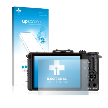 Parte frontal de un envase de producto con el logotipo de la marca upscreen. Al lado se muestra el dispositivo Pentax Q con su