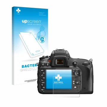 Parte frontal de un envase de producto con el logotipo de la marca upscreen. Al lado se muestra el dispositivo Nikon D600 con 