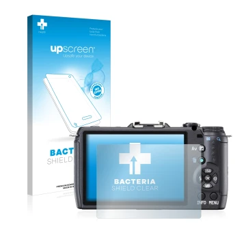 Parte frontal de un envase de producto con el logotipo de la marca upscreen. Al lado se muestra el dispositivo Pentax Q10 con 