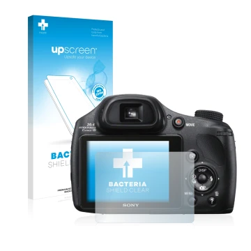 Parte frontal de un envase de producto con el logotipo de la marca upscreen. Al lado se muestra el dispositivo Sony Cyber-Shot