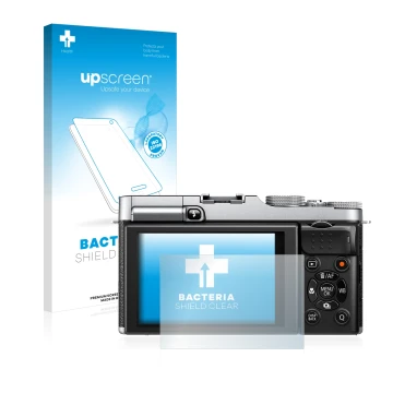 Parte frontal de un envase de producto con el logotipo de la marca upscreen. Al lado se muestra el dispositivo Fujifilm X-M1 c