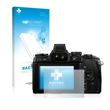 Parte frontal de un envase de producto con el logotipo de la marca upscreen. Al lado se muestra el dispositivo Olympus OM-D E-