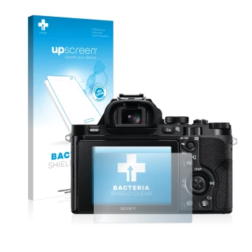 Parte frontal de un envase de producto con el logotipo de la marca upscreen. Al lado se muestra el dispositivo Sony Alpha 7 (I