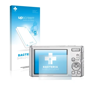 Parte frontal de un envase de producto con el logotipo de la marca upscreen. Al lado se muestra el dispositivo Sony Cyber-Shot
