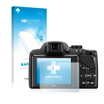 Parte frontal de un envase de producto con el logotipo de la marca upscreen. Al lado se muestra el dispositivo Nikon Coolpix P