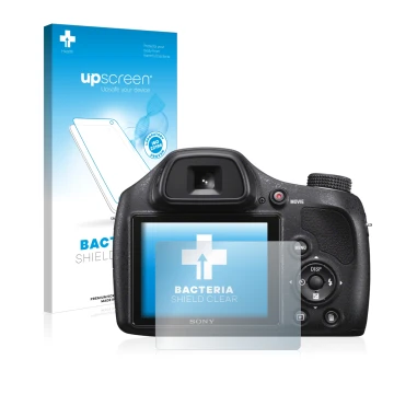 Parte frontal de un envase de producto con el logotipo de la marca upscreen. Al lado se muestra el dispositivo Sony Cyber-Shot