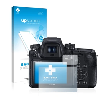 Parte frontal de un envase de producto con el logotipo de la marca upscreen. Al lado se muestra el dispositivo Samsung NX1 con