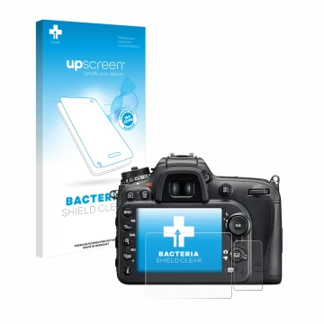 Parte frontal de un envase de producto con el logotipo de la marca upscreen. Al lado se muestra el dispositivo Nikon D7200 con