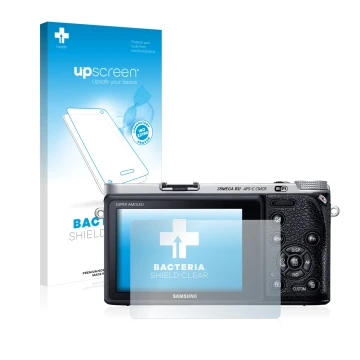 Parte frontal de un envase de producto con el logotipo de la marca upscreen. Al lado se muestra el dispositivo Samsung NX500 c