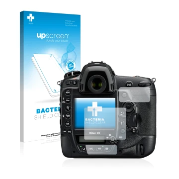 Parte frontal de un envase de producto con el logotipo de la marca upscreen. Al lado se muestra el dispositivo Nikon D5 con su