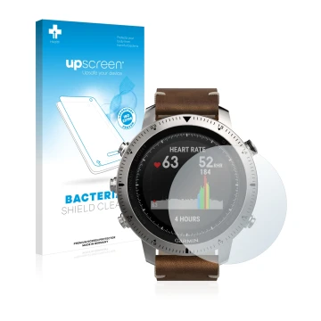 Parte frontal de un envase de producto con el logotipo de la marca upscreen. Al lado se muestra el dispositivo Garmin Fenix Ch