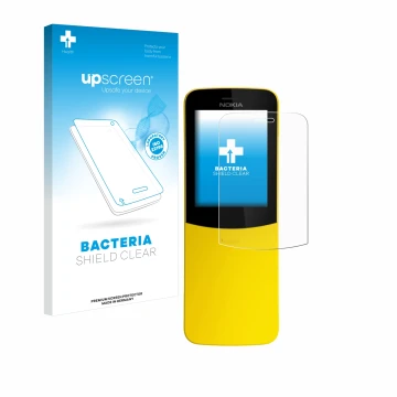 Parte frontal de un envase de producto con el logotipo de la marca upscreen. Al lado se muestra el dispositivo Nokia 8110 con 