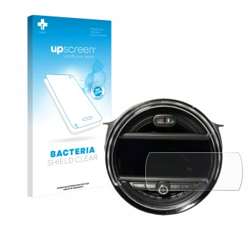 Parte frontal de un envase de producto con el logotipo de la marca upscreen. Al lado se muestra el dispositivo Mini Cooper F56