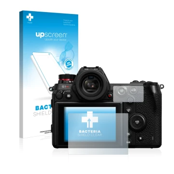 Parte frontal de un envase de producto con el logotipo de la marca upscreen. Al lado se muestra el dispositivo Panasonic Lumix