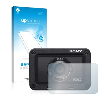 Parte frontal de un envase de producto con el logotipo de la marca upscreen. Al lado se muestra el dispositivo Sony DSC-RX0M2 