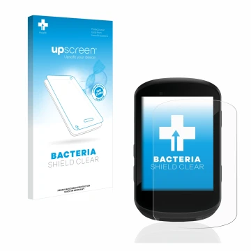 Parte frontal de un envase de producto con el logotipo de la marca upscreen. Al lado se muestra el dispositivo Garmin Edge 530