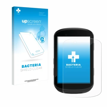 Parte frontal de un envase de producto con el logotipo de la marca upscreen. Al lado se muestra el dispositivo Garmin Edge 830