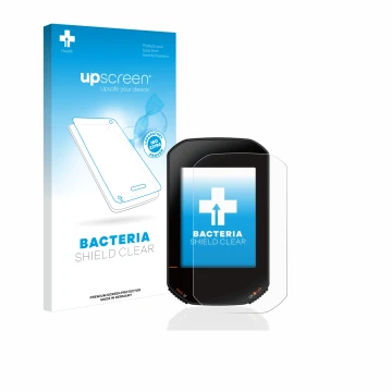 Parte frontal de un envase de producto con el logotipo de la marca upscreen. Al lado se muestra el dispositivo Bryton Rider 42