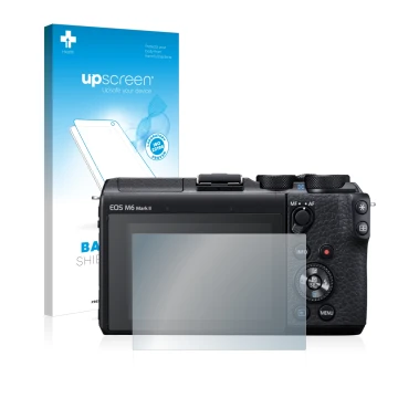 Parte frontal de un envase de producto con el logotipo de la marca upscreen. Al lado se muestra el dispositivo Canon EOS M6 Ma
