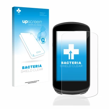 Parte frontal de un envase de producto con el logotipo de la marca upscreen. Al lado se muestra el dispositivo Garmin Edge 103