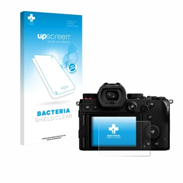 Parte frontal de un envase de producto con el logotipo de la marca upscreen. Al lado se muestra el dispositivo Panasonic Lumix