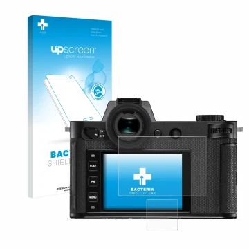 Parte frontal de un envase de producto con el logotipo de la marca upscreen. Al lado se muestra el dispositivo Leica SL2-S con