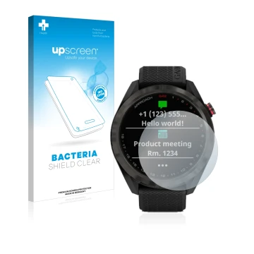 Parte frontal de un envase de producto con el logotipo de la marca upscreen. Al lado se muestra el dispositivo Garmin Approach