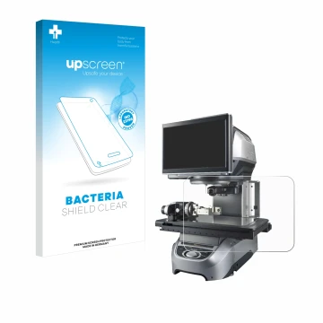 Parte frontal de un envase de producto con el logotipo de la marca upscreen. Al lado se muestra el dispositivo Keyence IM-8030