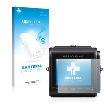 Parte frontal de un envase de producto con el logotipo de la marca upscreen. Al lado se muestra el dispositivo Hasselblad 907X