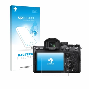 Parte frontal de un envase de producto con el logotipo de la marca upscreen. Al lado se muestra el dispositivo Sony Alpha 7 IV