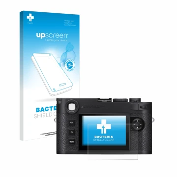 Parte frontal de un envase de producto con el logotipo de la marca upscreen. Al lado se muestra el dispositivo Leica M11 con s