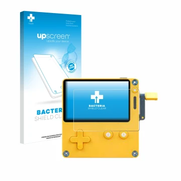 Parte frontal de un envase de producto con el logotipo de la marca upscreen. Al lado se muestra el dispositivo Panic Playdate 