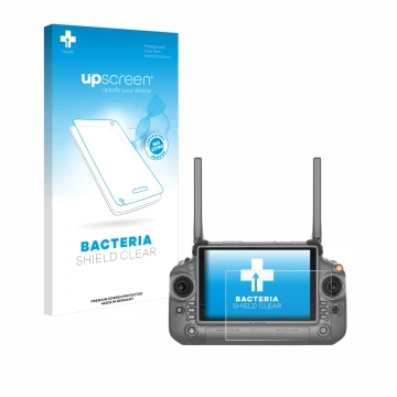 Parte frontal de un envase de producto con el logotipo de la marca upscreen. Al lado se muestra el dispositivo DJI RC Plus con