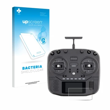 Parte frontal de un envase de producto con el logotipo de la marca upscreen. Al lado se muestra el dispositivo Radiomaster Box