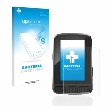 Parte frontal de un envase de producto con el logotipo de la marca upscreen. Al lado se muestra el dispositivo Wahoo Elemnt Ro