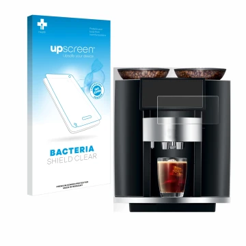 Parte frontal de un envase de producto con el logotipo de la marca upscreen. Al lado se muestra el dispositivo Jura Giga 10 co