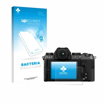 Parte frontal de un envase de producto con el logotipo de la marca upscreen. Al lado se muestra el dispositivo Fujifilm X-S20 