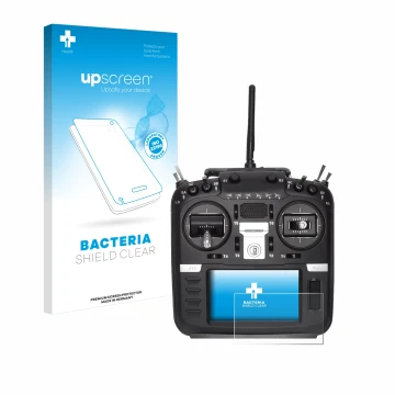 Parte frontal de un envase de producto con el logotipo de la marca upscreen. Al lado se muestra el dispositivo Radiomaster TX1