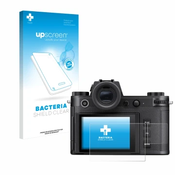 Parte frontal de un envase de producto con el logotipo de la marca upscreen. Al lado se muestra el dispositivo Leica SL3 (Pant